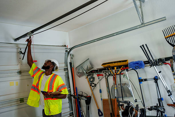 Professional Garage Door Panel Replacement technician working in White City, UT